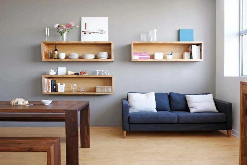 Shelves above the sofa in the interior