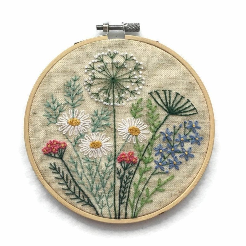 Embroidery with lavender nodules