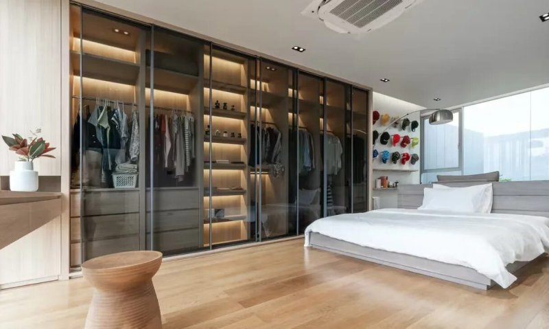 Design of the bedroom with a dressing room in a modern style