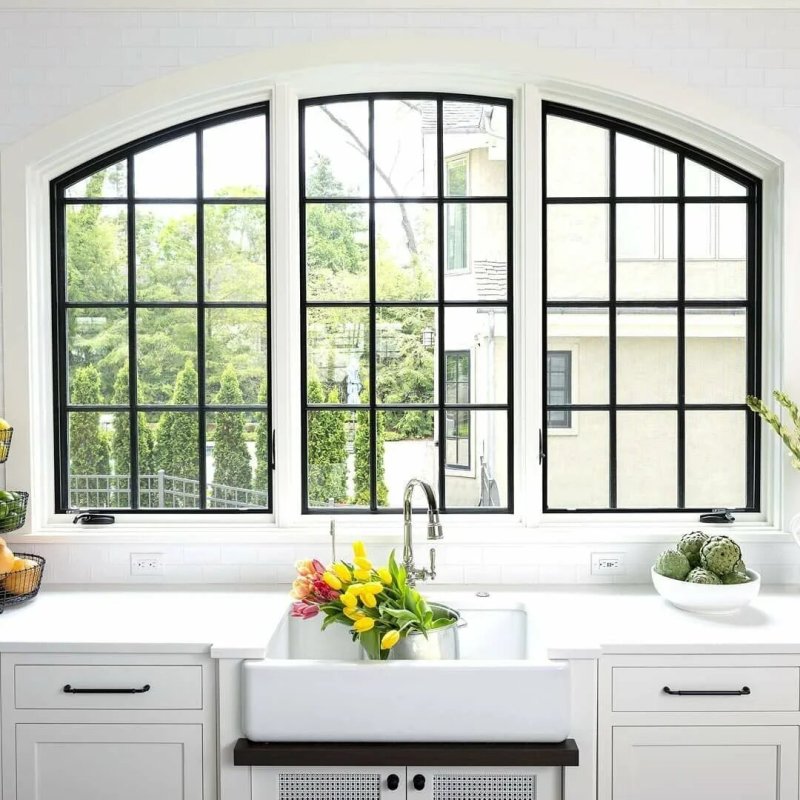 Kitchen with a large window in a private house