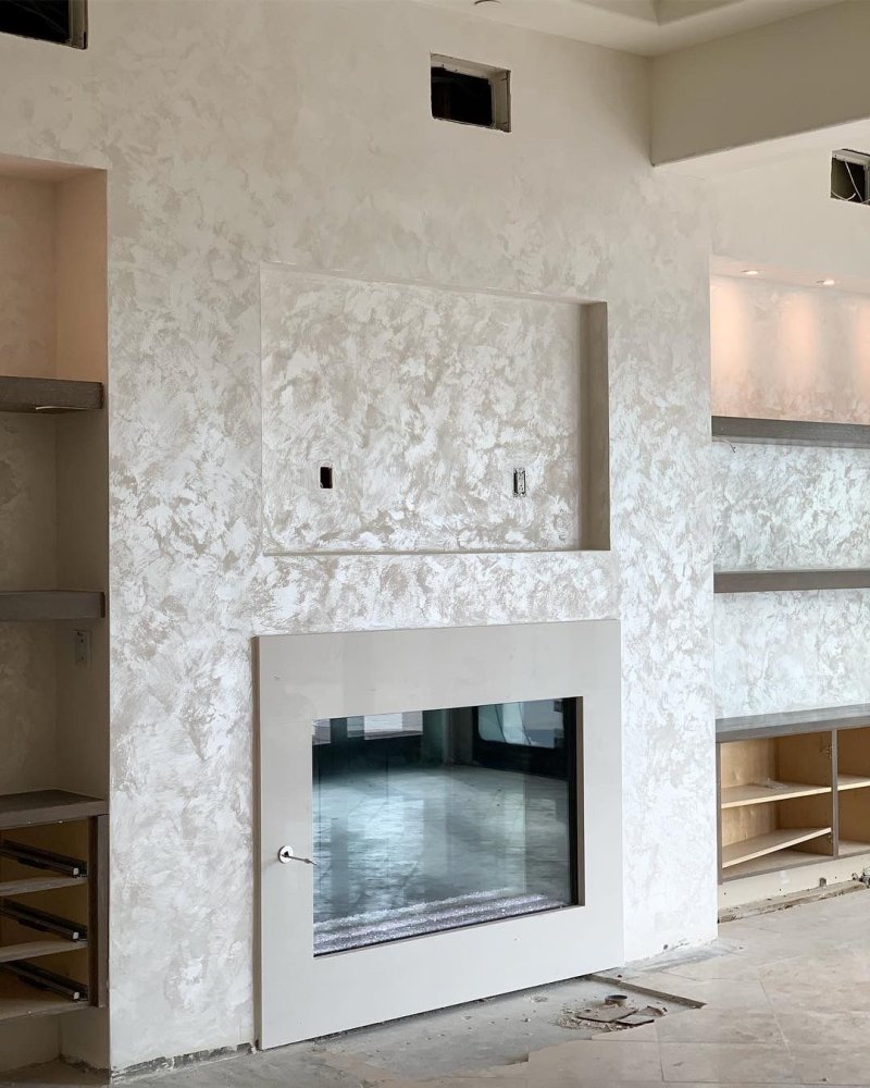 Decoration of the fireplace decorative plaster