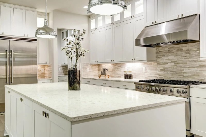 White kitchen with a stone countertop