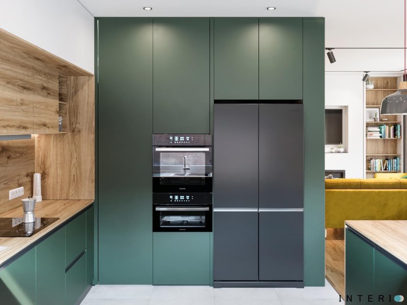 Kitchen in emerald color in a modern style