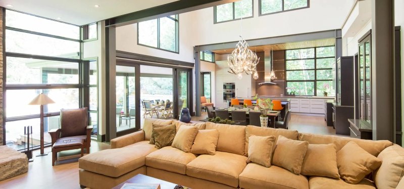 Living room with panoramic windows in a private house