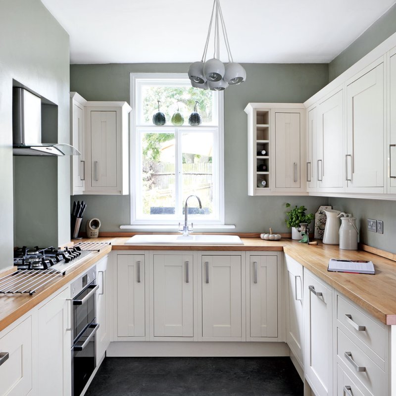 Ikea kitchen white with a wooden countertop