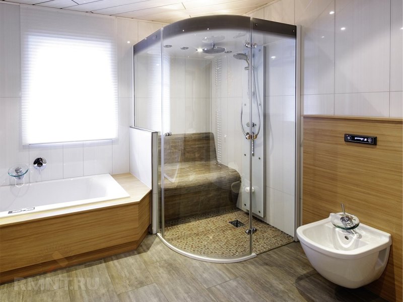 Bathtub and shower cabin