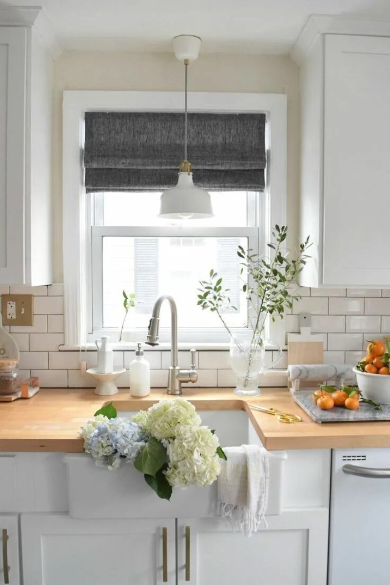 Kitchen design with a window above the sink