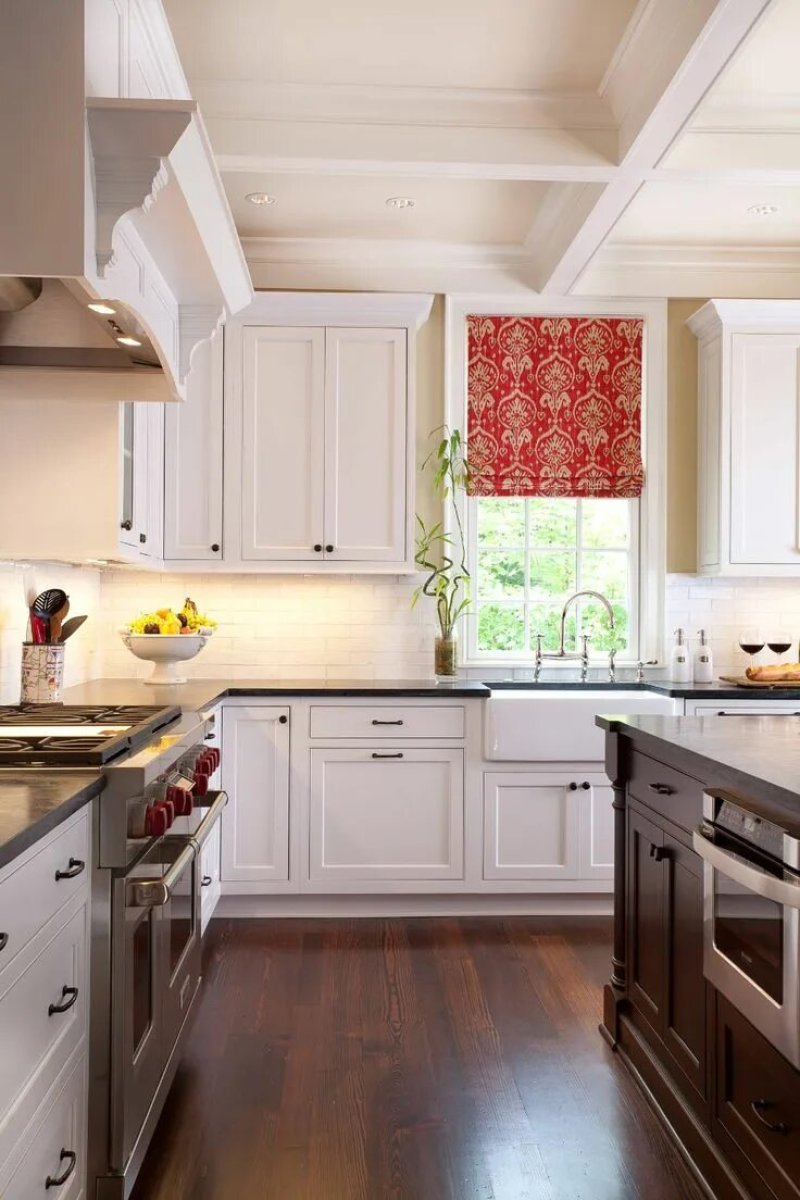 Kitchen design with a window in a private house