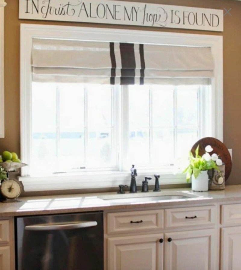 Roman curtain in the interior of the kitchen