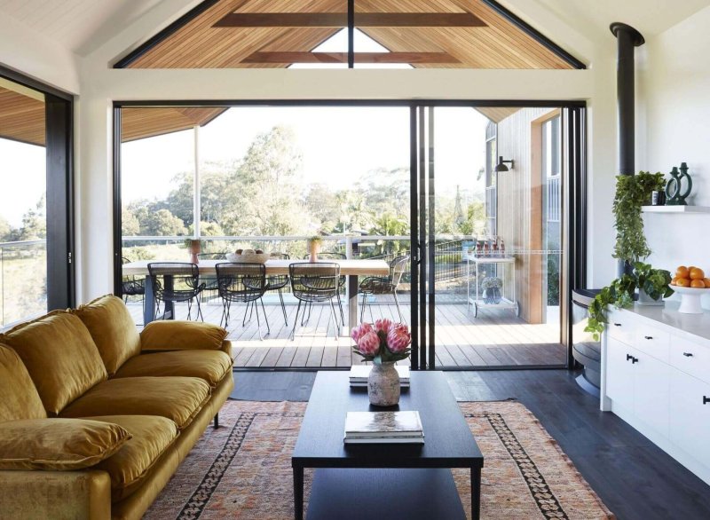 Living room with panoramic windows in a private house