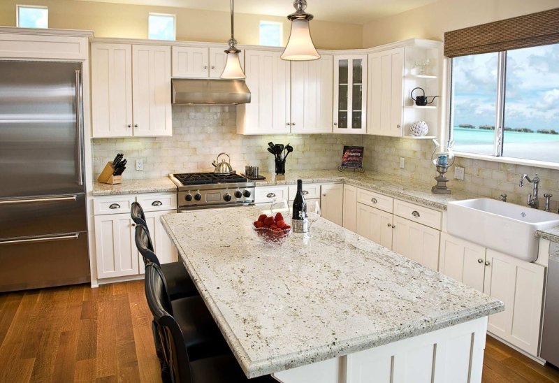 White kitchen with a stone countertop