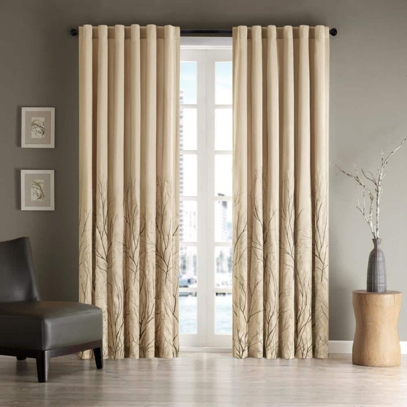 Beige curtains in the interior