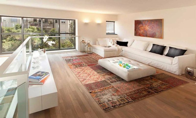 Carpet in the interior of the living room in a modern style