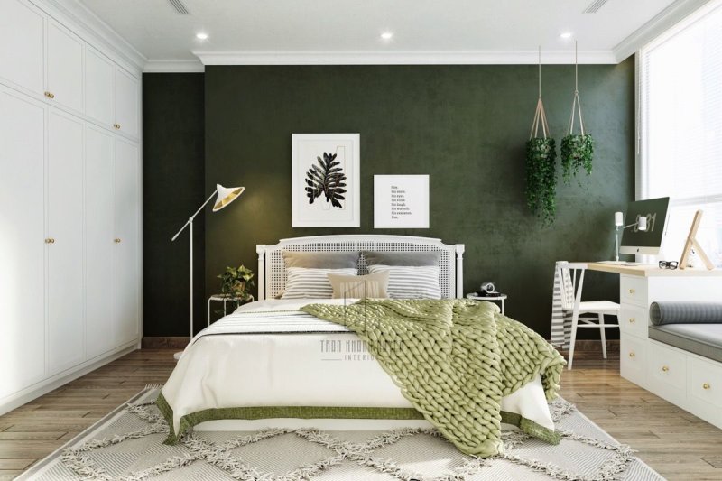 Green walls in the interior of the bedroom