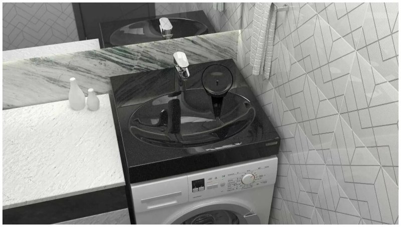 Sink over the washing machine on the countertop