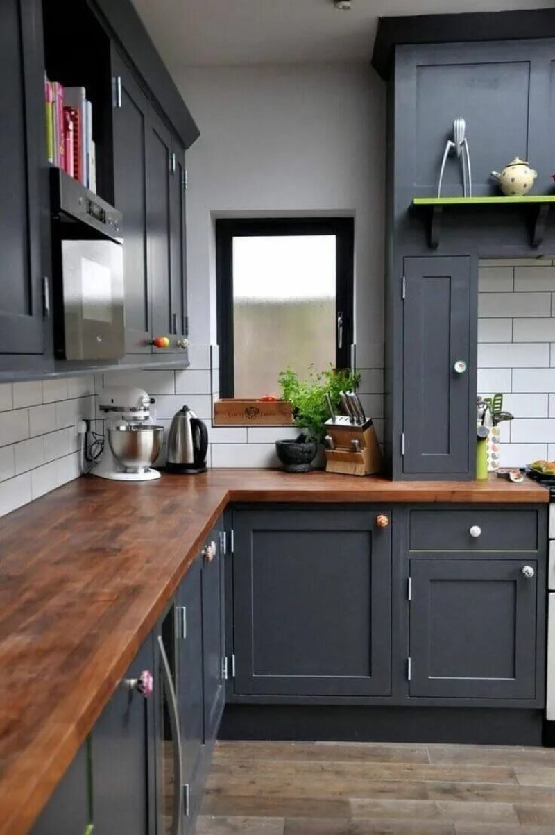 Gray kitchen with a wooden countertop