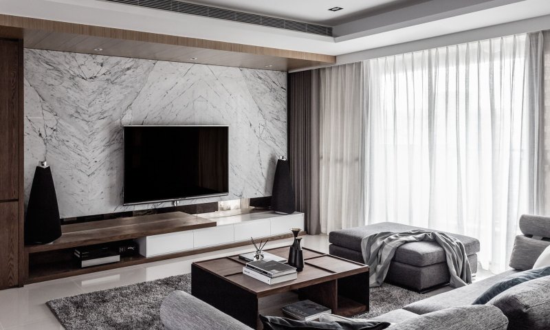 Living room with marble wall