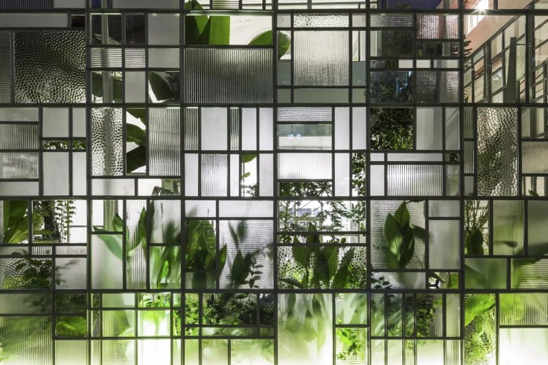 Glass partition with plants