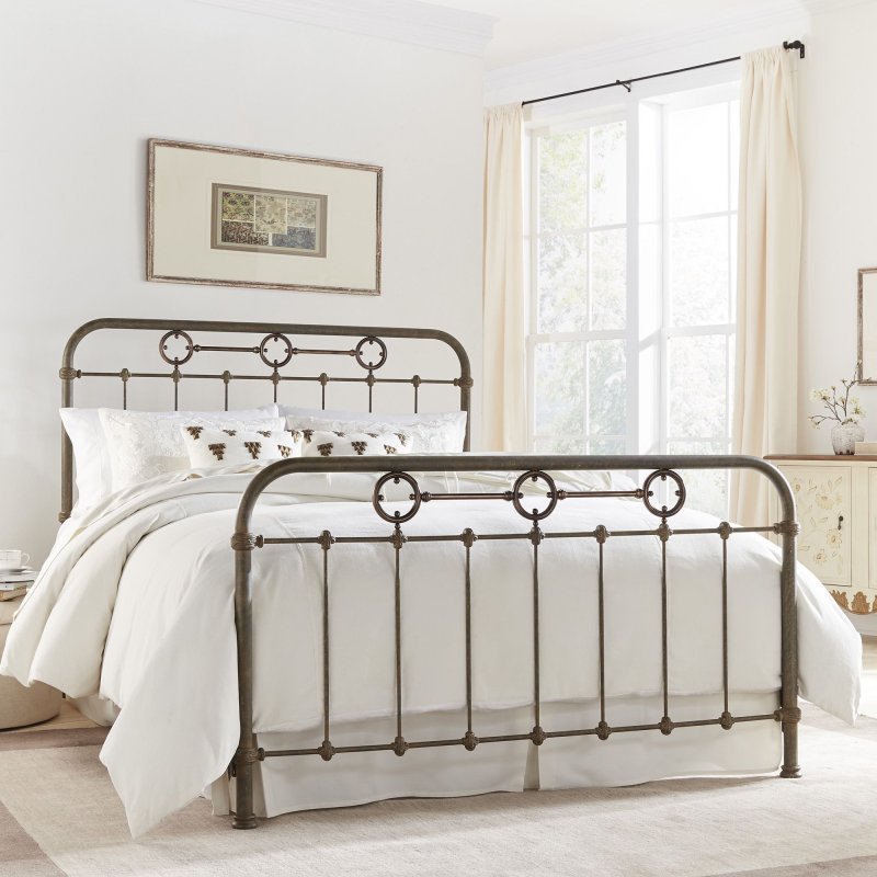 Metal bed in the interior of the bedroom