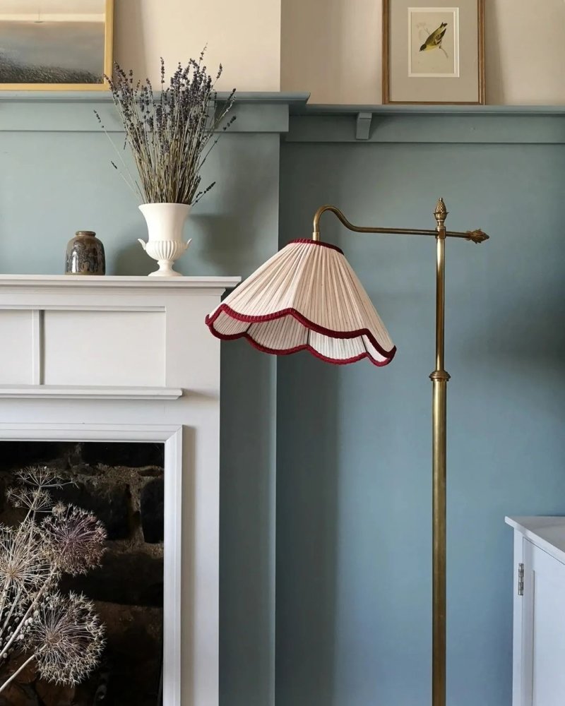 Farmer with lampshade in the interior