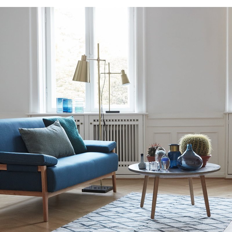 Skandi living room with a blue sofa