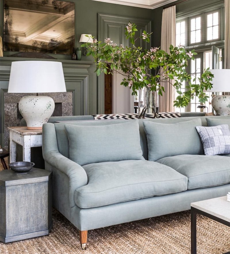 Blue sofa in the interior of the living room