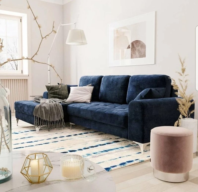 Blue sofa in the interior of the living room