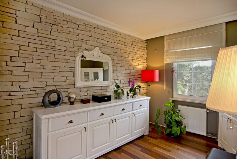 Decorative stone in the interior of the kitchen