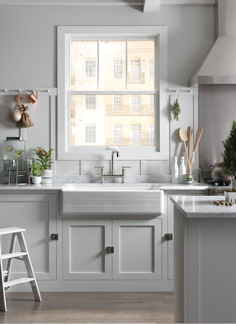 Kitchen design with a window above the sink