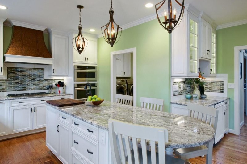 The interior of the kitchen in olive colors