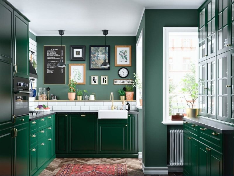 The kitchen is dark green