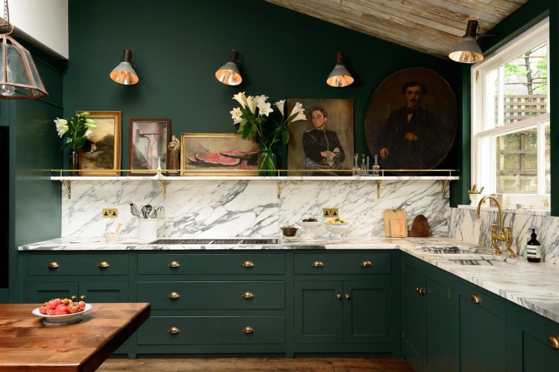 Dark green kitchen in the interior