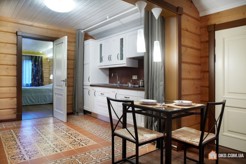 Kitchen in a wooden house in the interior