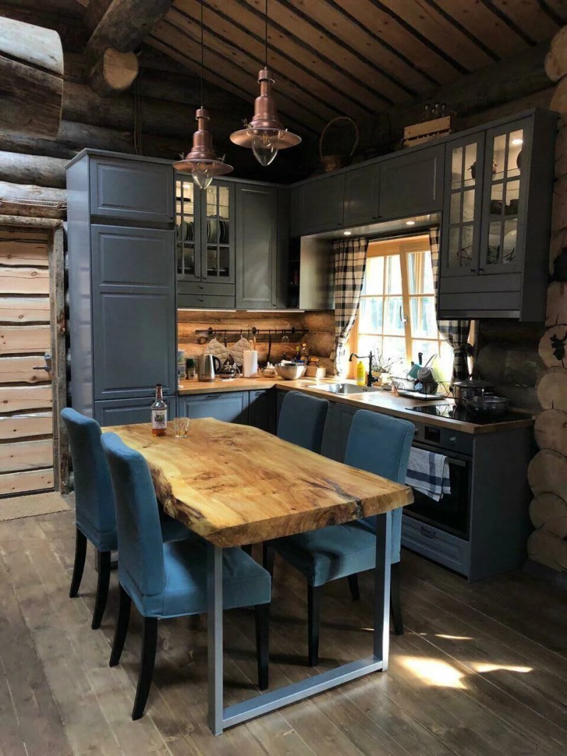 The interior of the kitchen in the style of a chalet in a country house