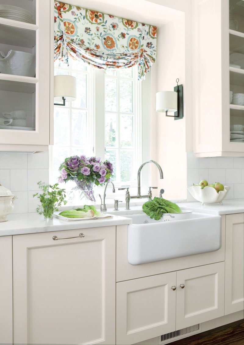 Kitchen design with a window above the sink