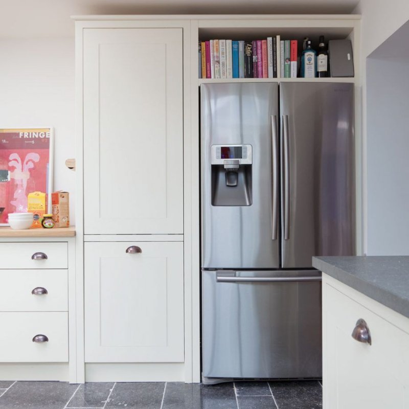 A closet above the refrigerator