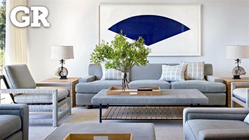 Blue sofa in the interior of the living room