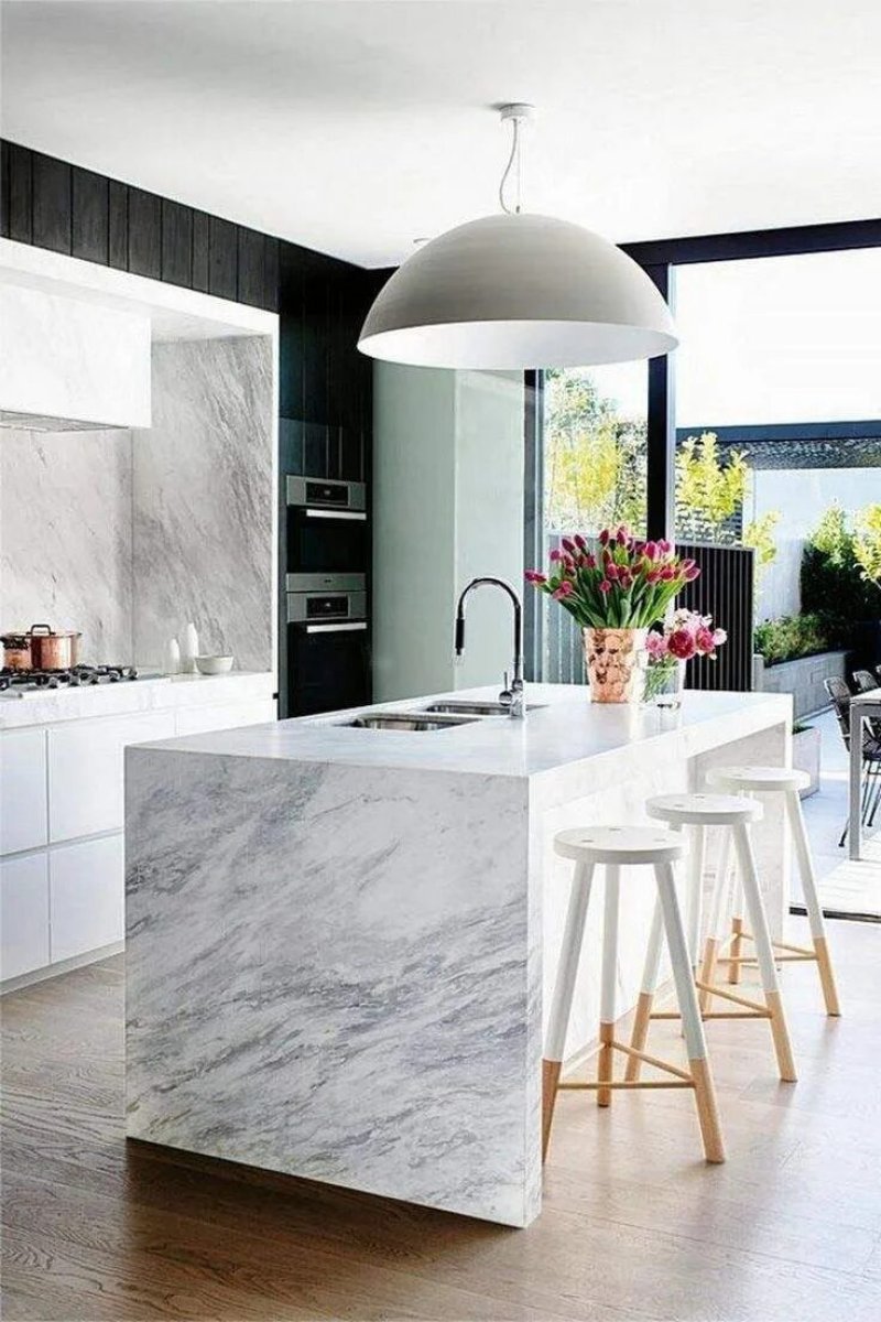 The design of the kitchen is marble