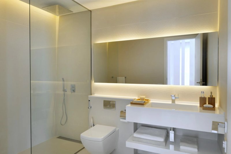 Bathroom with a large mirror