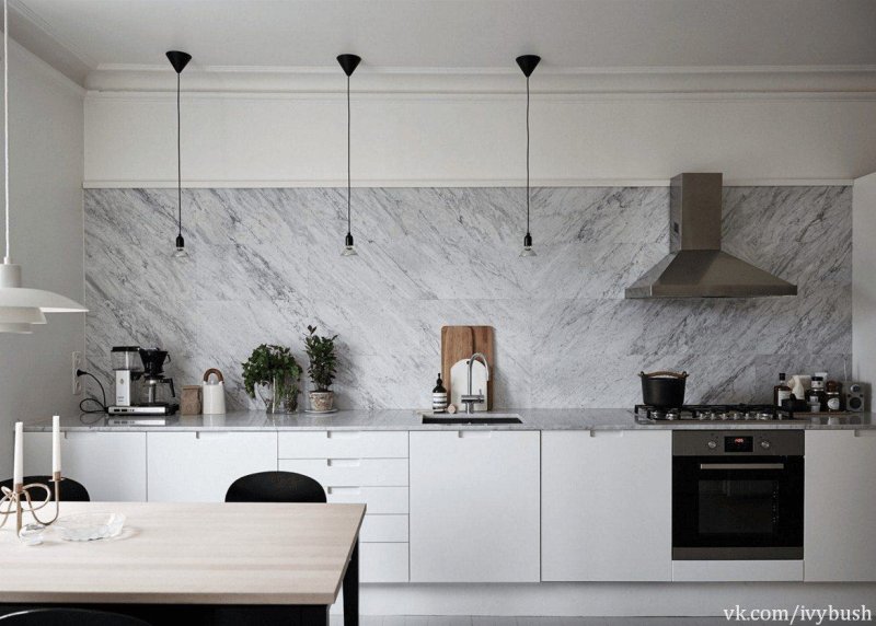 White kitchen with marble apron