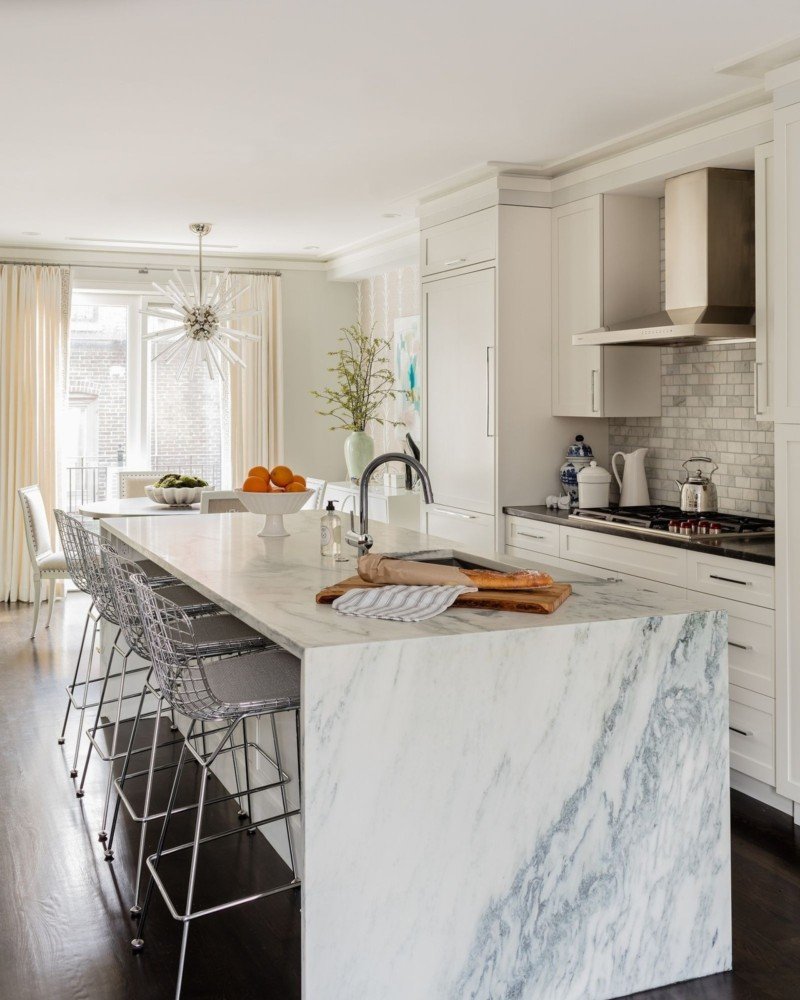 White kitchen with a marble tabletop