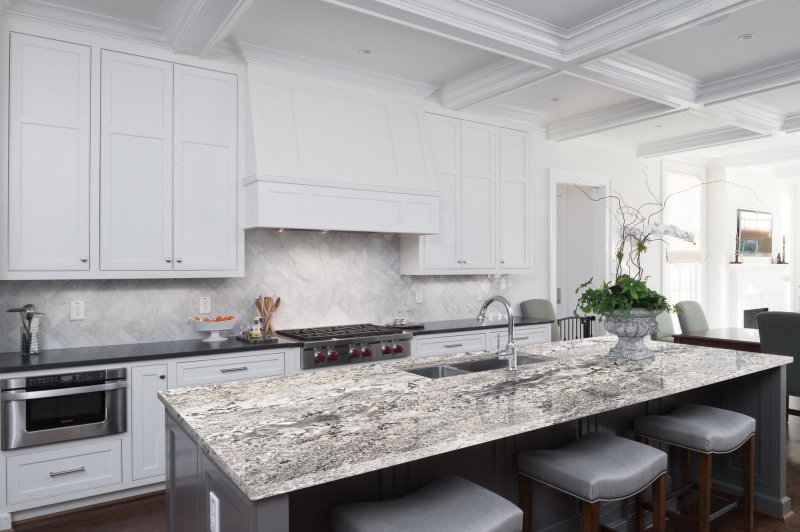 Gray kitchen with a marble tabletop