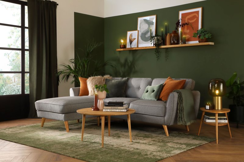 Green sofa in the Scandil interior