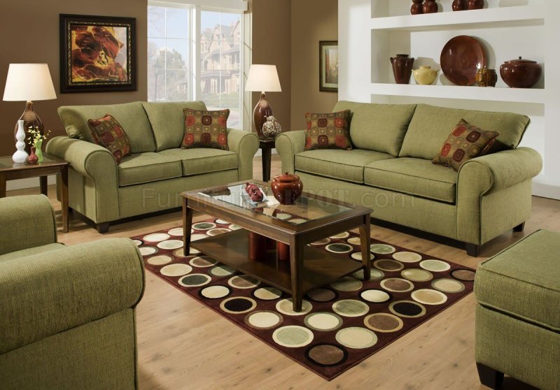 Olive sofa in the interior of the living room