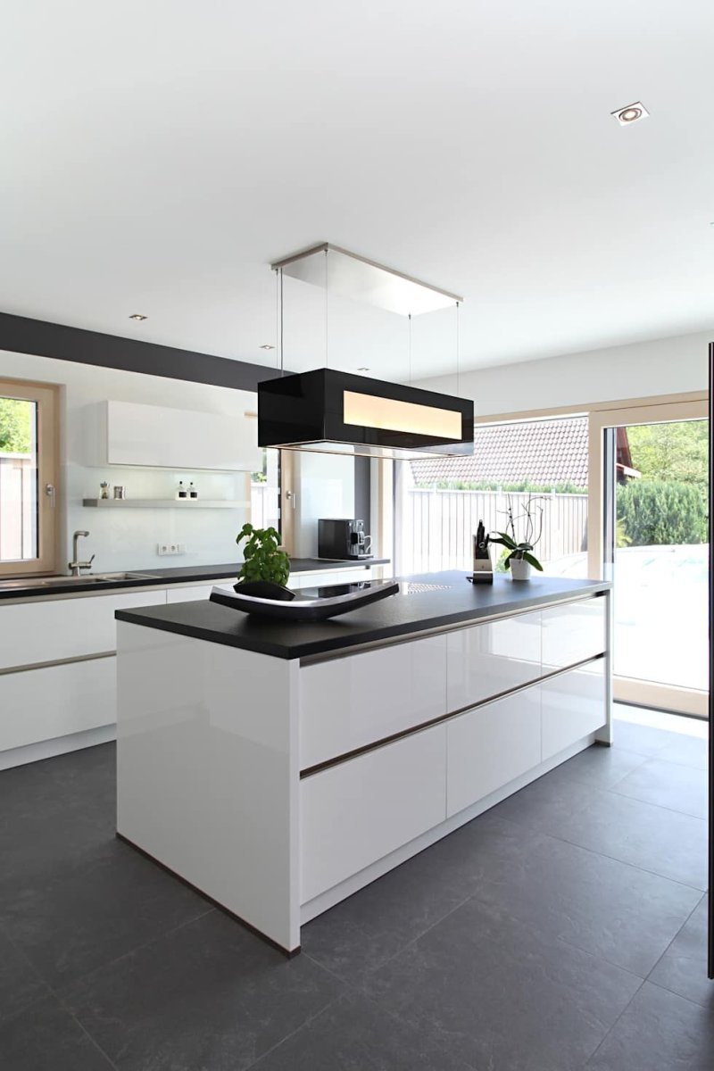 White glossy kitchen with island