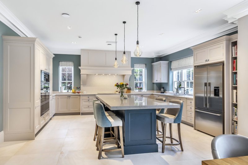 Gray kitchen with blue chairs