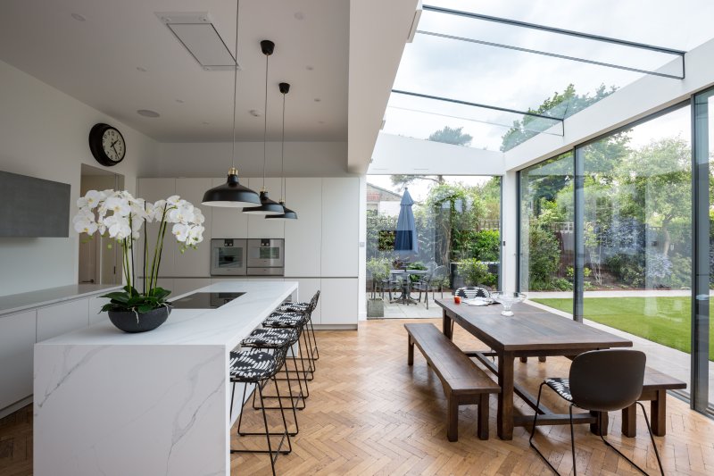 Kitchen living room with panoramic windows in a private house