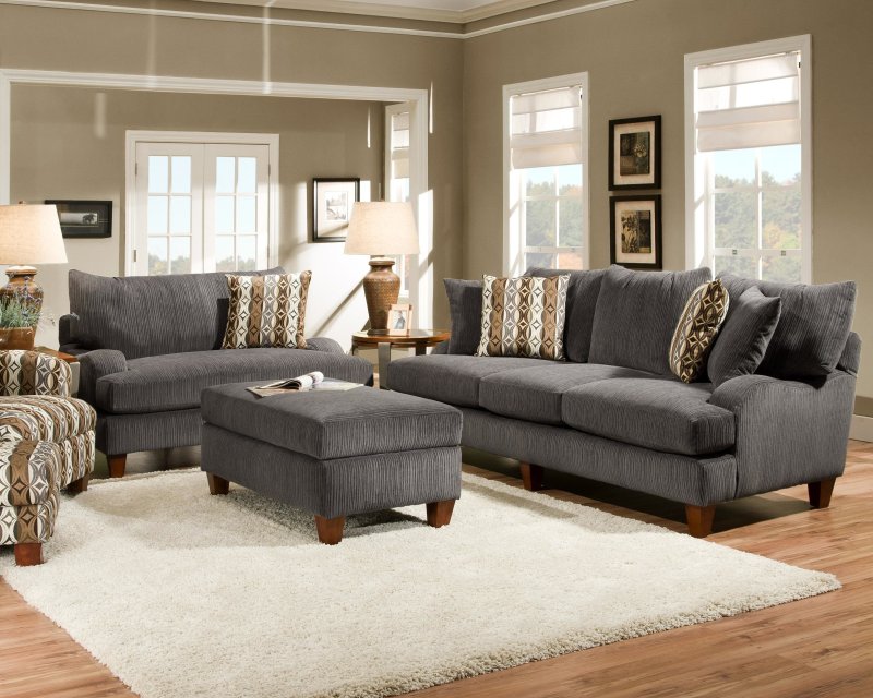 Gray sofa in the interior of the living room