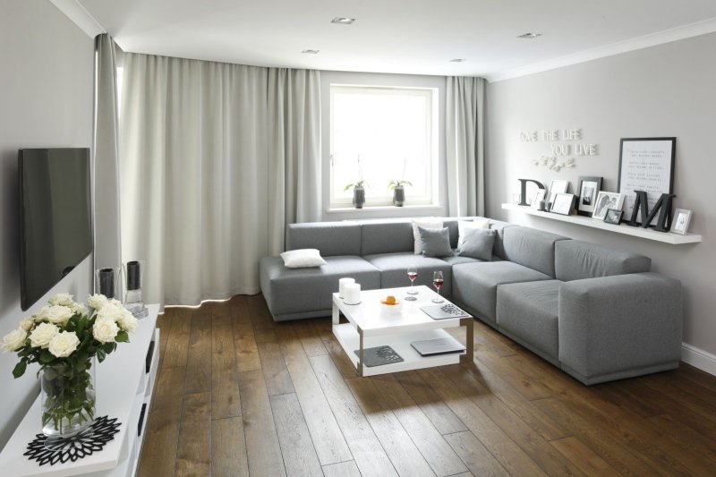 Living room interior with a gray sofa