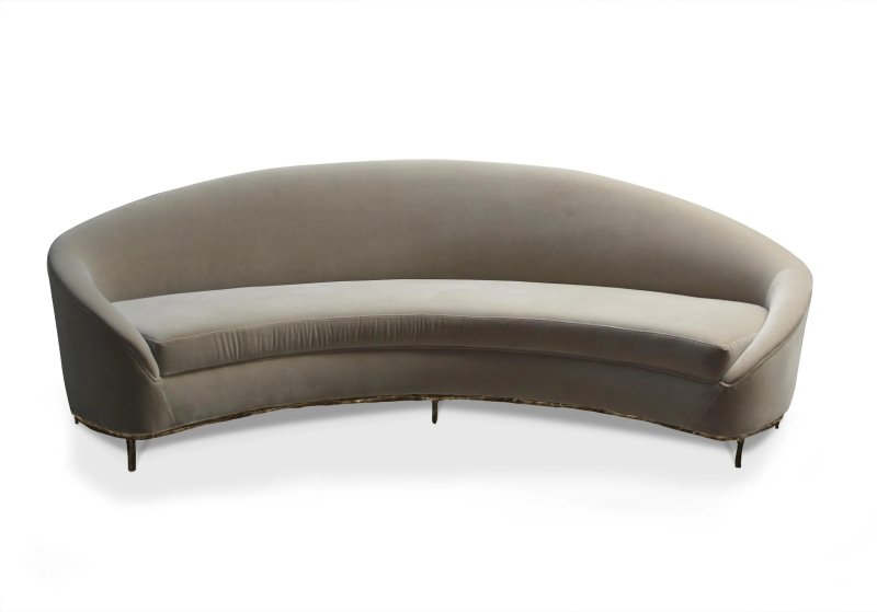 A sofa with a rounded back